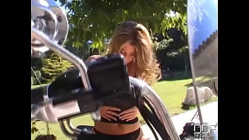 Sexy Babe Michelle Enjoys A Cigar